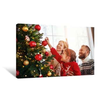 Image of Happy Family Mother, Father And Child Daughter Decorate Christmas Tree Canvas Print