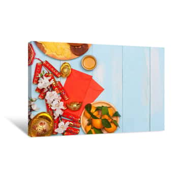 Image of Lunar New Year Firecrackers And Chinese Gold Ingots And Traditional Red Envelopes And Decoration With Fresh Oranges On Wooden Background Canvas Print