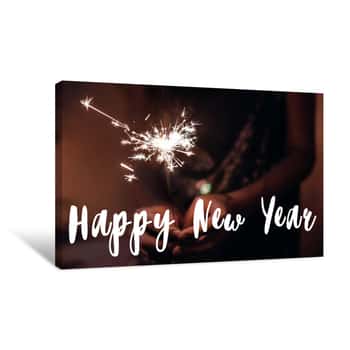 Image of Happy New Year Text Sign, Greeting Card Hand Holding A Burning Sparkler Firework Bengal Light  Burning Sparkler Closeup In Female Hand In Dark  Happy New Year  Happy Holidays Canvas Print