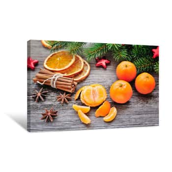 Image of Tangerines And Christmas Tree Branches On A Wooden Table  Natura Canvas Print