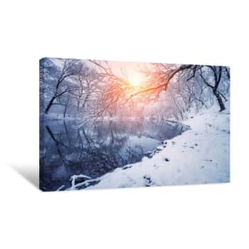 Image of Winter Forest On The River At Sunset  Colorful Landscape With Snowy Trees, Frozen River With Reflection In Water  Seasonal  Winter Trees, Lake, Sun And Blue Sky  Beautiful Snowy Winter In Countryside Canvas Print