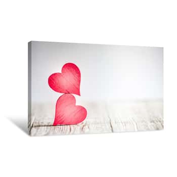 Image of Two Red Hearts On Wooden Background Canvas Print
