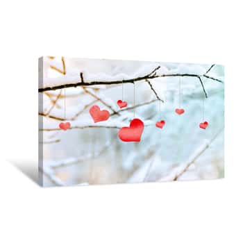 Image of Wooden Red Heart On Snowy Tree Branch In Winter Canvas Print