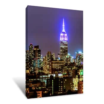 Image of Empire State Building Glows Blue Canvas Print