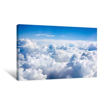 Image of White Clouds On Blue Sky Background Close Up, Cumulus Clouds High In Azure Skies View From Airplane Canvas Print