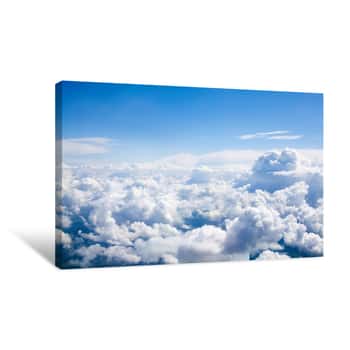 Image of White Clouds On Blue Sky Background Close Up, Cumulus Clouds High In Azure Skies, Beautiful Aerial Cloudscape View From Above, Sunny Heaven Landscape, Bright Cloudy Sky View From Airplane, Copy Space Canvas Print