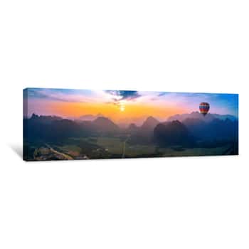 Image of Aerial View Of Vang Vieng With Mountains And Balloon At Sunset Canvas Print
