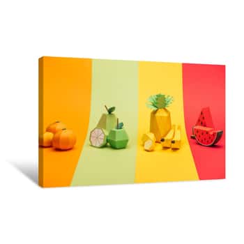 Image of Various Handmade Paper Fruits On Stripes Of Colorful Paper Canvas Print