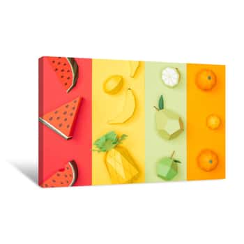 Image of Top View Of Various Handmade Origami Fruits On Multicolored Paper Stripes Canvas Print