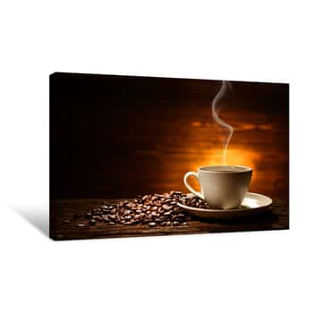 Image of Cup Of Coffee With Smoke And Coffee Beans On Old Wooden Background Canvas Print