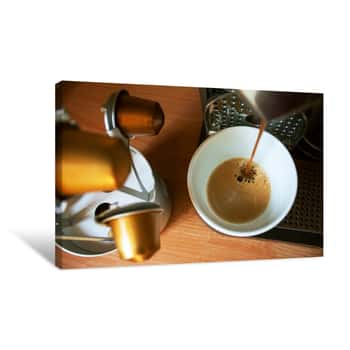 Image of Morning Cup Of Fragrant Coffee From Coffee Machine On The Wooden Background With Capsules Holder Canvas Print