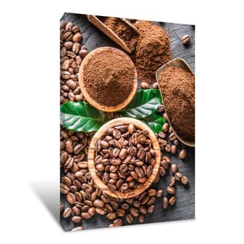 Image of Roasted Coffee Beans  And Ground Coffee On Wooden Table  Top View Canvas Print