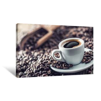Image of Cup Of Black Coffee With Beans On Wooden Table Canvas Print