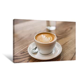 Image of Latte Art In Cappuccino Coffee Cup At Cafe Table  Closeup Of Rosetta Flower Drawing In Foam Canvas Print