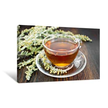 Image of Tea With Gray Wormwood In Glass Cup On Table Canvas Print