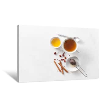 Image of Tea In A Cup With Cinnamon, Honey And Rosehip  Copy Space Text Canvas Print