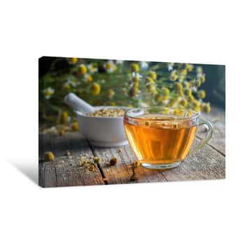 Image of Healthy Chamomile Tea Or Infusion, Mortar And Daisy Herbs On Wooden Board Canvas Print