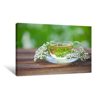 Image of Crystal Cup With Green Tea On Table Canvas Print