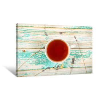 Image of чай свежий стоит на столе Canvas Print