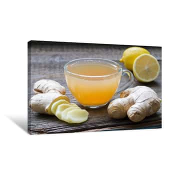 Image of Ginger Homemade Tea Infusion On Wooden Board With Lemon Canvas Print