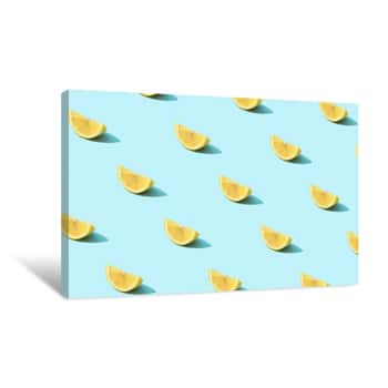 Image of Trendy Sunlight Summer Pattern Made With Yellow Lemon Slice On Bright Light Blue Background  Minimal Summer Concept Canvas Print