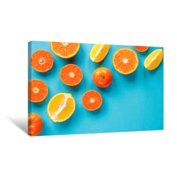Image of Summer Fruit Pattern Of Fresh Citruses On A Blue Background  Concept Orange And Lemon Flat Lay Canvas Print