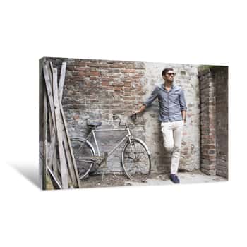 Image of Man With His Bicycle Canvas Print