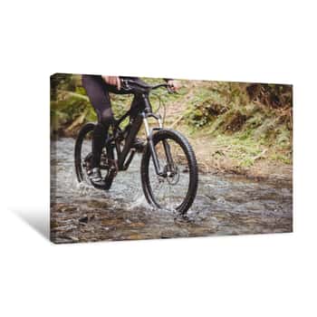 Image of Mountain Biker Riding In Stream Canvas Print
