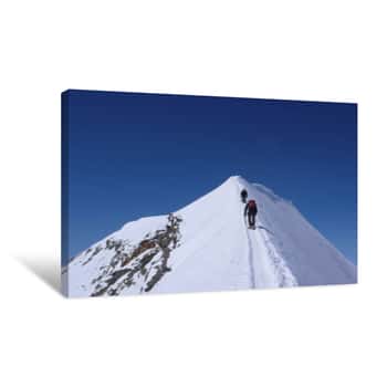 Image of Two Mountain Climbers On An Exposed Ridge In The Swiss Alps Canvas Print