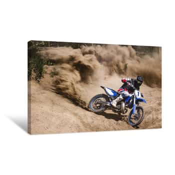 Image of Motocross Rider Creates A Large Cloud Of Dust And Debris Canvas Print