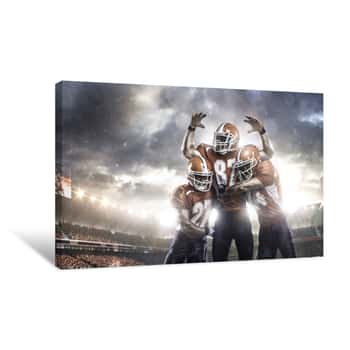 Image of American Football Players In Action On Stadium Canvas Print