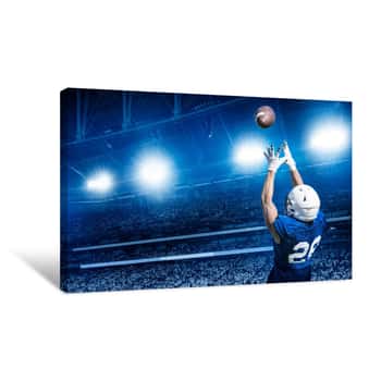 Image of American Football Player Catching A Touchdown Pass In A Large Stadium  View From Below Canvas Print