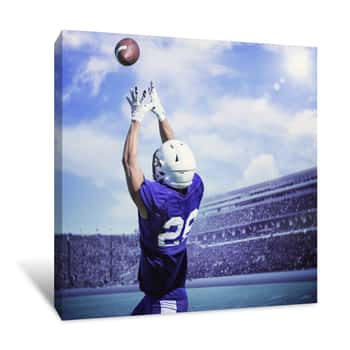 Image of American Football Player Catching A Touchdown Pass In A Large Outdoor Football Stadium Canvas Print