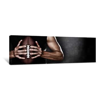Image of Football Player Man Player Holding American Football On Black Blackboard Texture Background With Copy Space For Text Or Design  Panoramic Banner Canvas Print