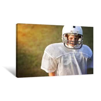 Image of Young Boy In A Football Uniform Looking Sad Canvas Print