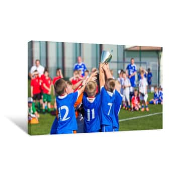 Image of Young Sport Team With Trophy  Boys Celebrating Sports Achievement  Young Soccer Players Holding Trophy  Celebrating Soccer Football Championship  Winning Team Of Sport Tournament For Kids Children Canvas Print