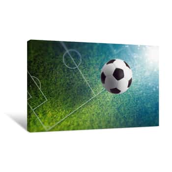 Image of Soccer Ball On Green Soccer Field Canvas Print
