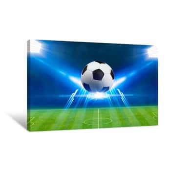 Image of Soccer Ball, Bright Spotlights, Illuminates Green Soccer Stadium Canvas Print