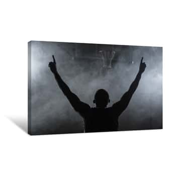 Image of Rear View Of A Basketball Player With His Arms In The Air Canvas Print