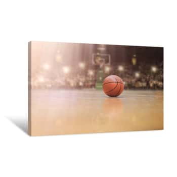 Image of Basketball Ball In Front Of Big Modern Basketball Arena Canvas Print