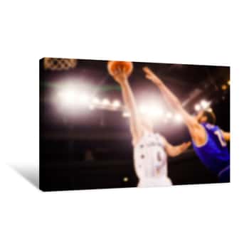 Image of Scoring During A Basketball Game - Ball In Hoop - Blurred Image Canvas Print