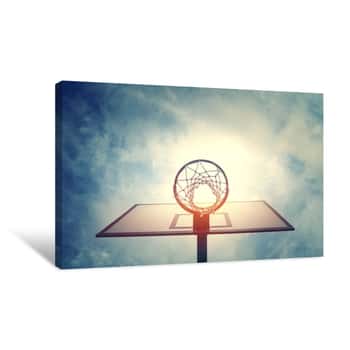 Image of Basketball Hoop On Basketball Court Under Blue Sky With Clouds Canvas Print