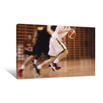 Image of Two Young High School Basketball Players Playing Game  Youth Basketball Players Running In Motion Blur Durning Action  Basketball School Tournament Canvas Print