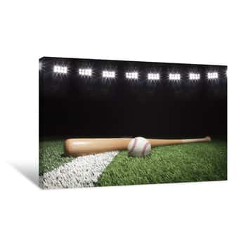 Image of Baseball And Bat At Night Under Stadium Lights On Grass Field Canvas Print