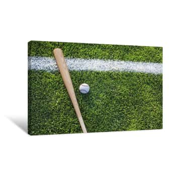 Image of Baseball Bat And Ball On Grass Field Viewed From Above Canvas Print