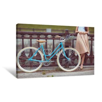 Image of Young Beautiful, Elegantly Dressed Woman With Bicycle Canvas Print