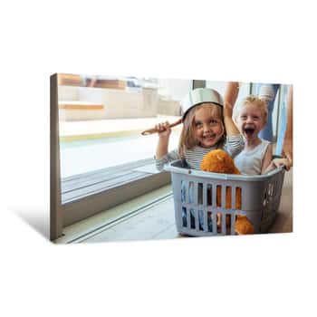 Image of Kids Rides In A Laundry Basket Canvas Print