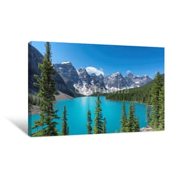Image of Beautiful Turquoise Waters Of The Moraine Lake With Snow-covered Peaks Above It In Rocky Mountains, Banff National Park, Canada Canvas Print