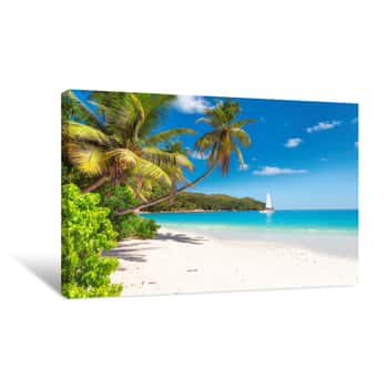 Image of Sandy Beach With Palm Trees And A Sailing Boat In The Turquoise Sea On Paradise Island Canvas Print
