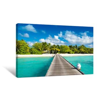 Image of Wooden Bridge To Beautiful Sandy Beach Under The Shade Of Palms And Tropical Plants, Maldives Canvas Print